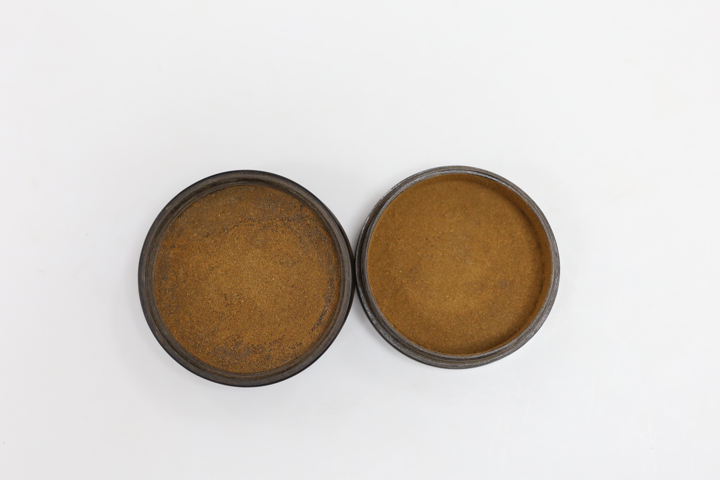 A composition and metal snuff box, with Third Reich insignia. 7cm diameter